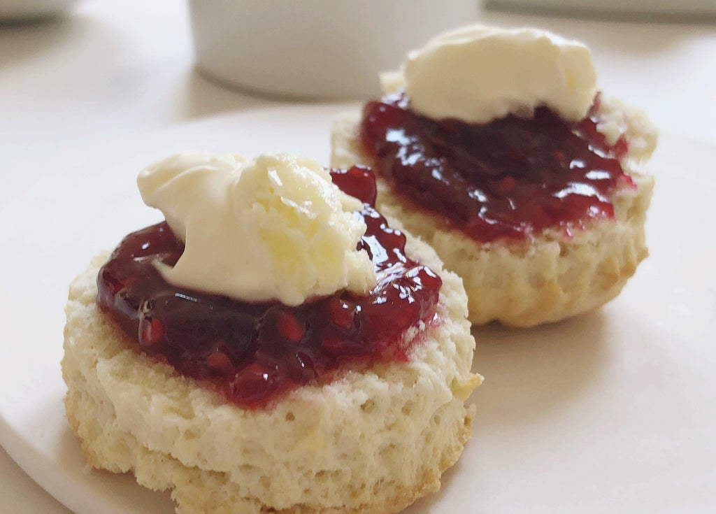 Delicious scones with Roots & Wings Organic award winning raspberry jam. Ideal for an indulgent teatime treat.
